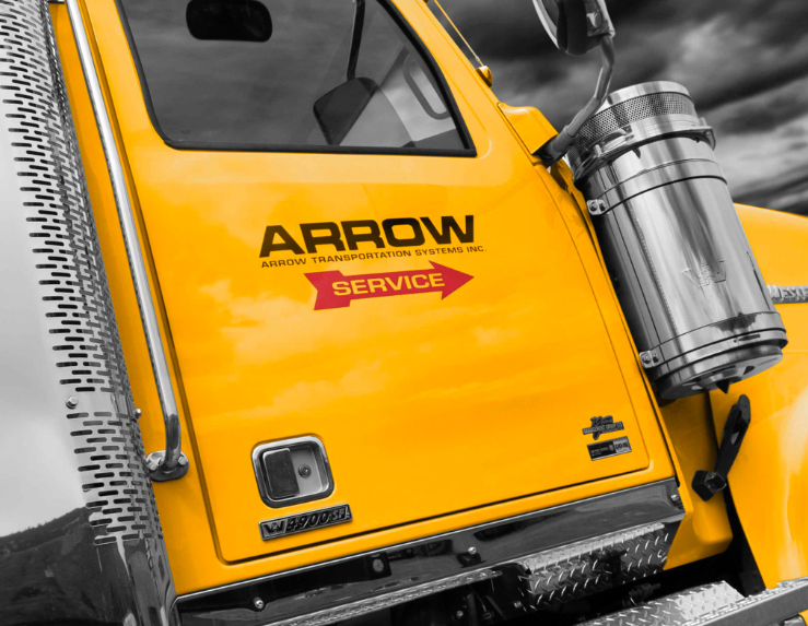 Large yellow truck with Arrow logo